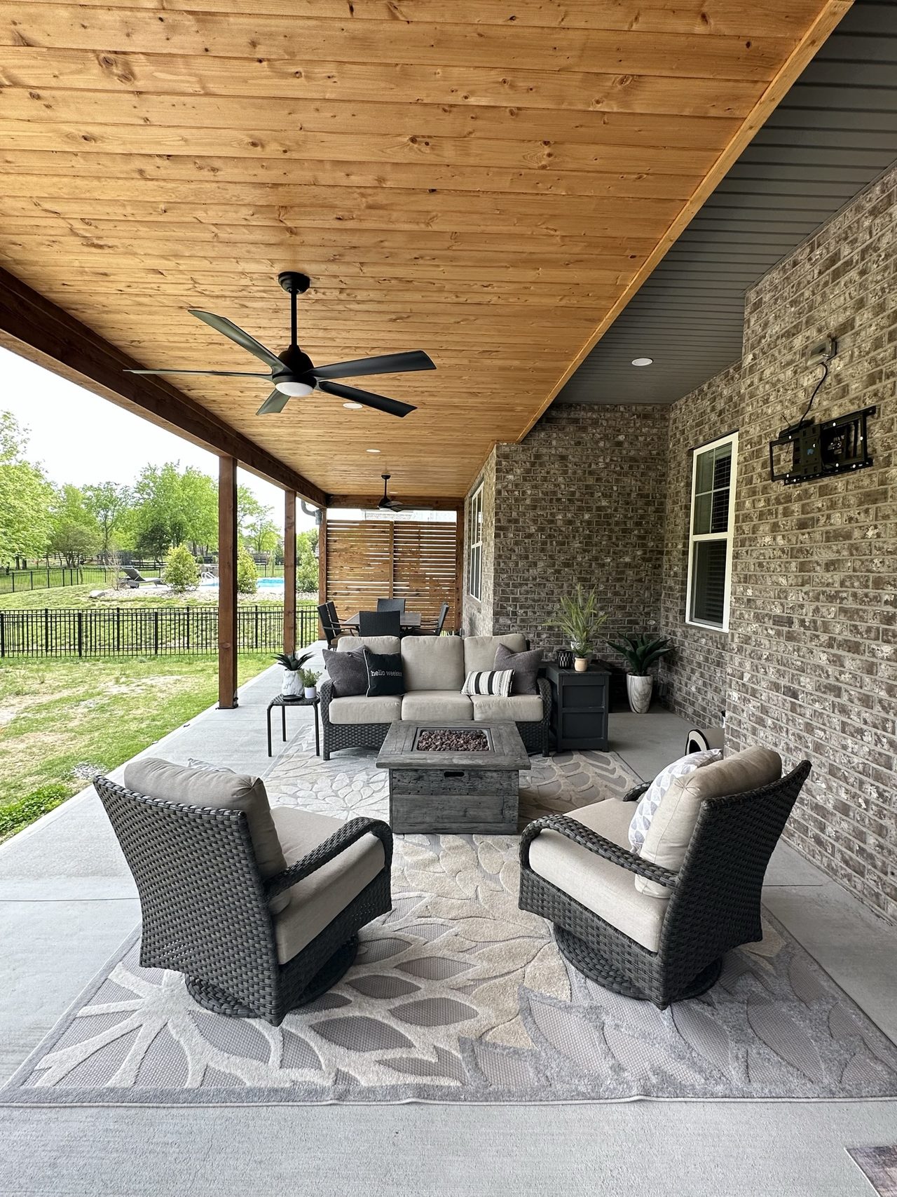 Completed covered porch addition matched to the existing roofline
